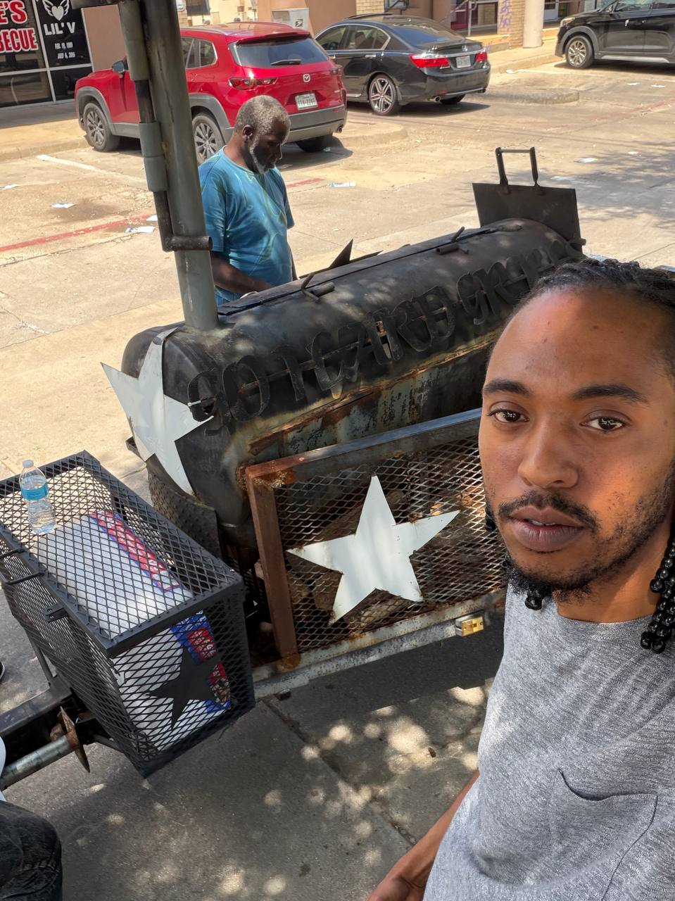 Selfie at the Go Hard Grills smoker on location